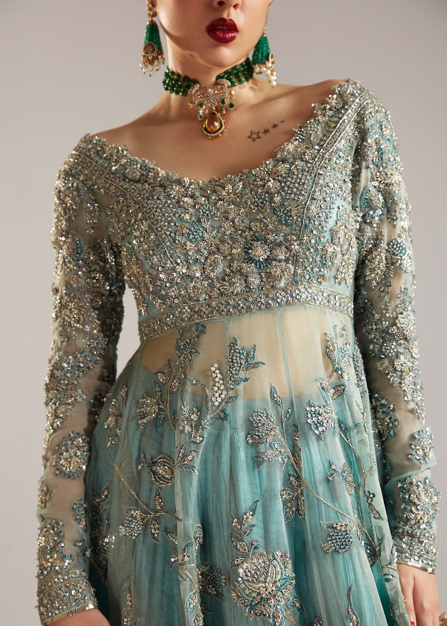 FK ASTRA pakistani fashion outfit with coordinated formal styling.